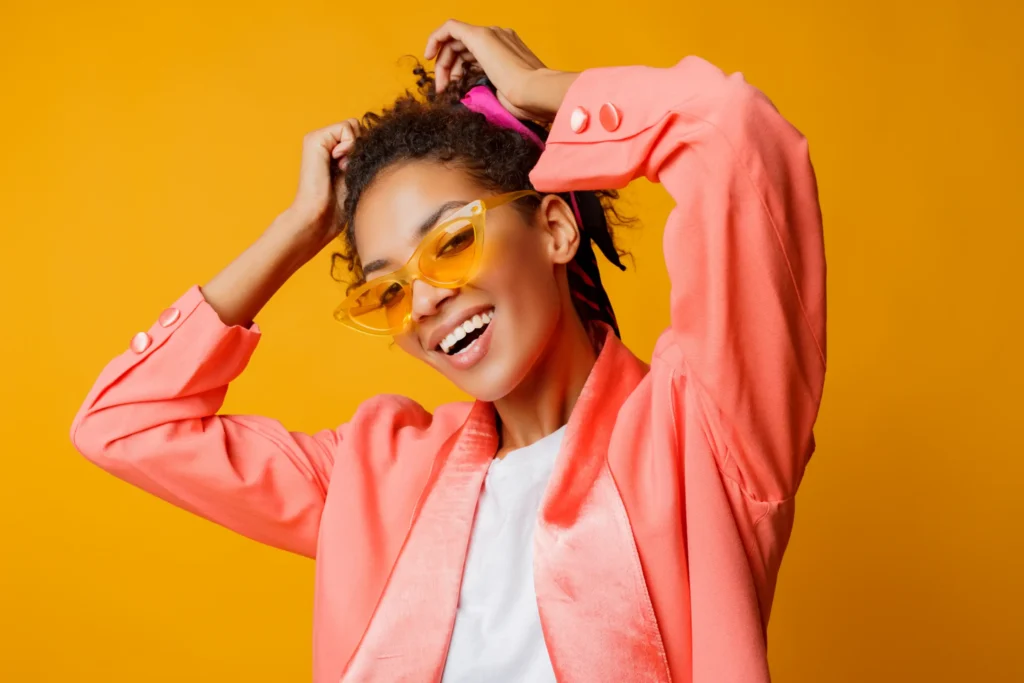 debonair-african-woman-with-perfect-smile-curly-hairs-natural-make-up